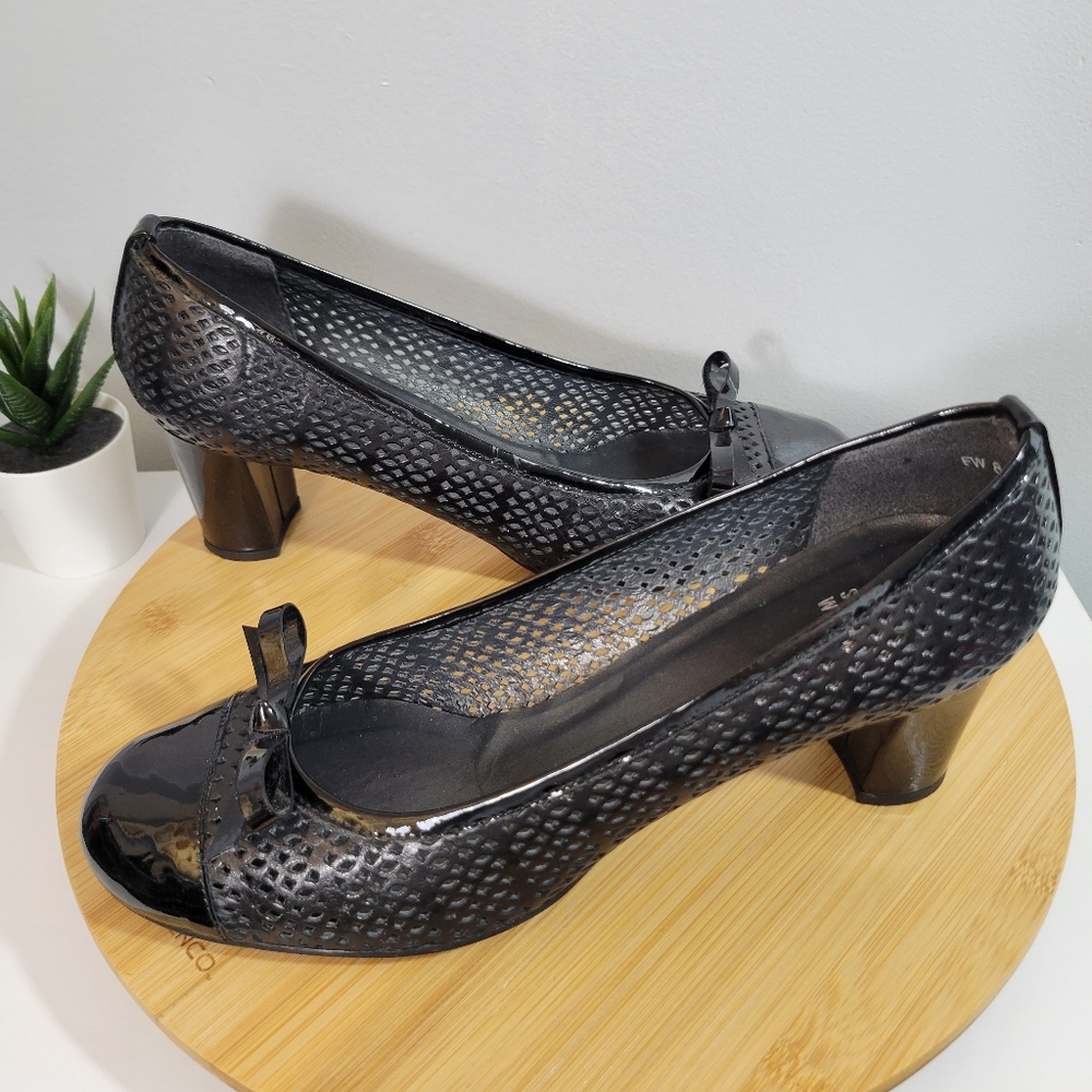 STUART WEITZMAN Captivate perforated black round toe chunky heel pumps